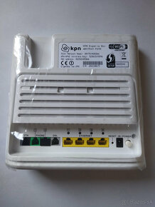 ISDN, ADSL modem, router, TV, VOIP, Wifi b/g/n, 4 ports, 10 - 2