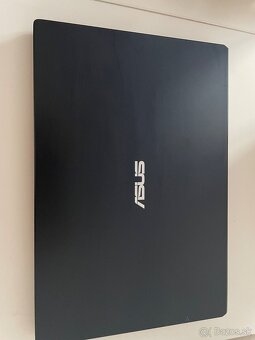 Asus e210M - 2