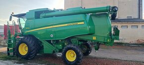 John Deere 670i HM - 2