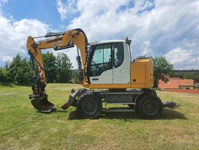 Kolesové rypadlo Liebherr 910 - 2