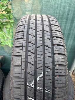 Predám 4ks celoročne pneu Continental 215/65R16 - 2