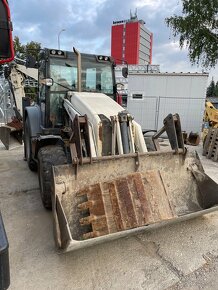 2x Terex TLB 850 - 2