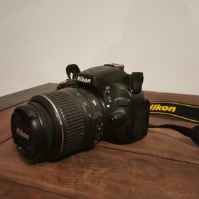 Nikon D5100 + 18-55 AF-S DX VR - 2