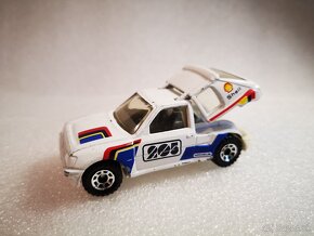 Predám kovový zberateľský model auta Peugeot 205 GTI 1:43 , - 2