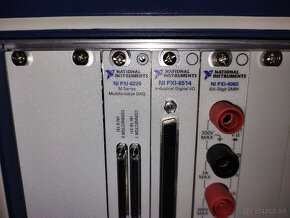 National Instruments NI PXI-1033 + 6 1/2 digit multimeter. - 2