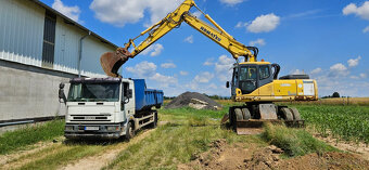 Báger Komatsu PW220 - 2