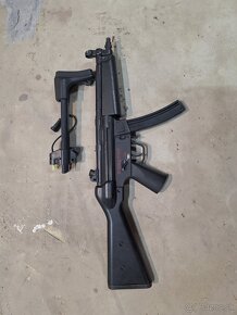 Airsoft MP5 A4. JG - 2