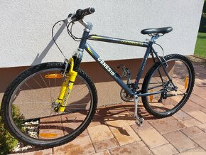 Horský odpruzeny bicykel 26" Genesis - 2