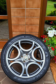 alu R17 4x100, orig. Alfa Romeo MITO, pneu 215/45 - 2