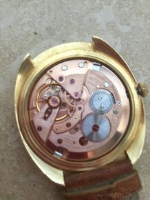 0mega 18K zlate hodinky - 2