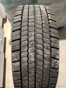 PNEUMATIKY, ZÁBEROVKY NA MEGA ŤAHAČ 295/60 R22.5 - 2