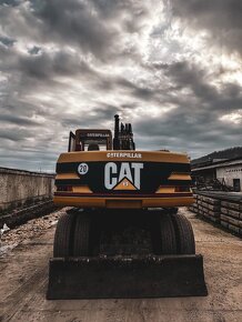 Cat m315 kolesovy bager - 2