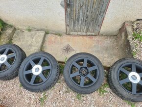 Audi elektrony+gumy 205/55r16 zima - 2