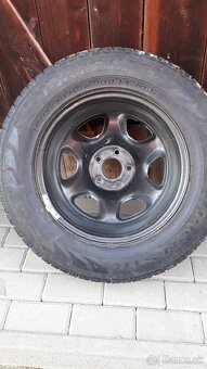 Plechový disk + pneu 215/70 R16 - 2