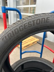 Bridgestone 265/40/21”-105H zimne - 2