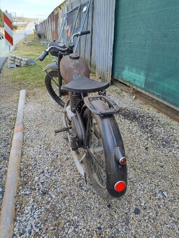 Starý motocykel - Čz 125t - 2