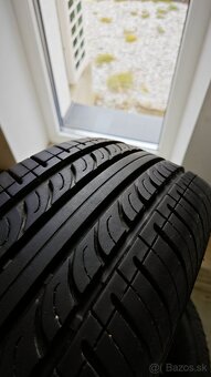 Letné pneumatiky 185/60 R14 + plechové disky - 2