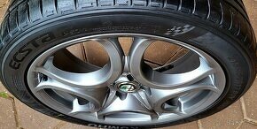 alu R17 4x100, orig. Alfa Romeo MITO, pneu 215/45 - 2