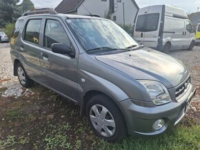 SUBARU JUSTY BENZÍN 4X4 - 2