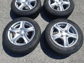 1.Suzuki Swift Alu disky 175/65 R15 - 2