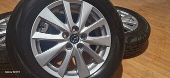 Predám letnú sadu alu. disky Mazda CX + 225/65 R17 Yokohama - 2