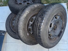 Plechové disky s pneu 165/70 r14 vw,škoda,seat - 2