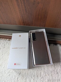 Huawei P Smart 2021 (zlato-ružový)+ príslušenstvo

 - 2