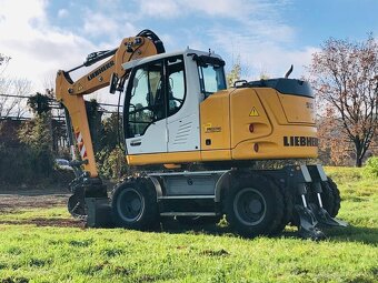 Kolesové rypadlo Liebherr A910 - 3