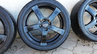 Dezent RE Dark 4x100 r15 - 3