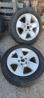 Alu disku škoda crateris 5X112 r16 zimné gumy Goodyear - 3