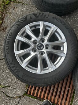 R16 Mazda 3 5x114.3 stred67.1 - 3