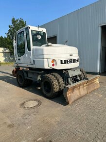 Kolový otočný bagr LIEBHERR A309 - 3