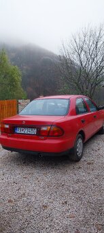 Mazda 323 1.3i - 3