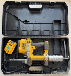 DeWALT DCGG571M1 Aku Mazací lis 18V - 3