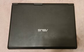 Asus X58L - 3