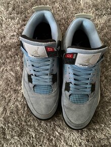 Jordan 4 UNC - 3