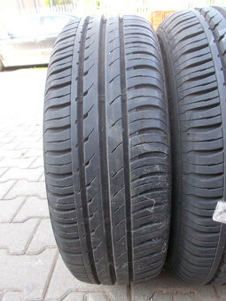 Plechové disky Ford + 185/65R14 - 3