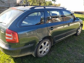 zadny naraznik, kufor, piate dvere, škoda octavia 2 combi - 3