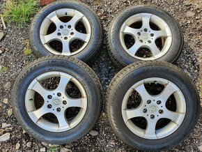 zimni alu kola Alfa Opel 5x110 6,5jx15 et38 - 3