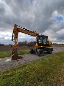 Kolesové rypadlo / bager JCB JS 145W - 3