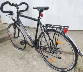 Trekingový bicykel 21 rám 28 kolesá 3x7prevov Shimano svetlá - 3