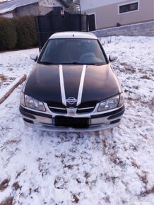 Nissan Almera 1.5 - 3