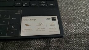 Laptom Asus E210M - 3