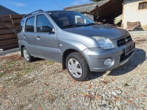 SUBARU JUSTY BENZÍN 4X4 - 4