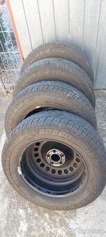 Predám plechové disky 5x105 R16 zimné pneumatiky 215/65 R16 - 4