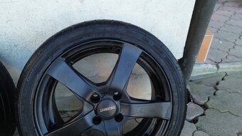 Dezent RE Dark 4x100 r15 - 4