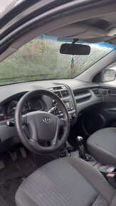 Kia Stportage 2.0i - 4