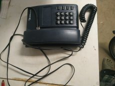 Telefon. - 4