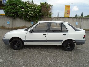 Peugeot 309 1,4i - 4