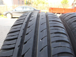 Plechové disky Ford + 185/65R14 - 4